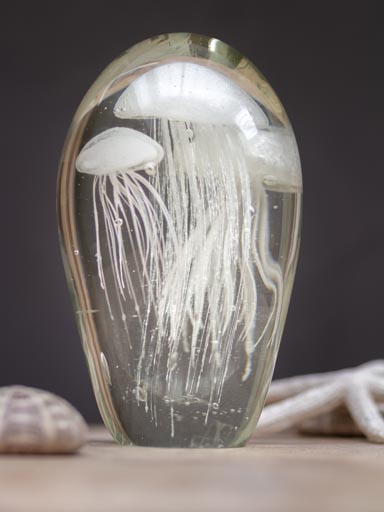 Glass paperweight w/ 3 white jellyfishes.