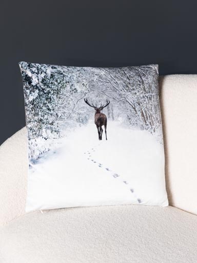 Cushion deer in snowy landscape
