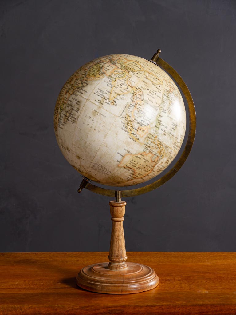 Beige globe on natural wooden base - 1