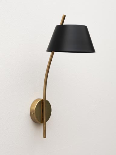 Golden wall light with black shade