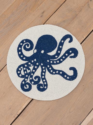 Round placemat with blue octopus