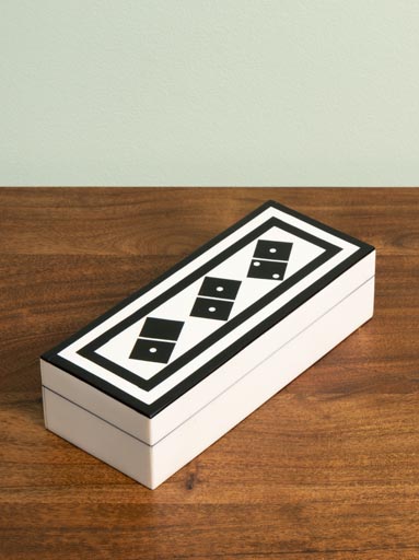 White box with black domino