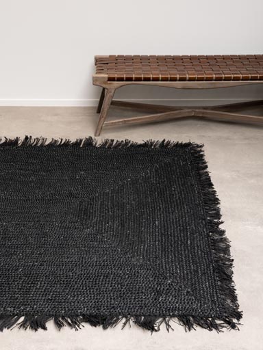 Large braided black hemp rug with tassels