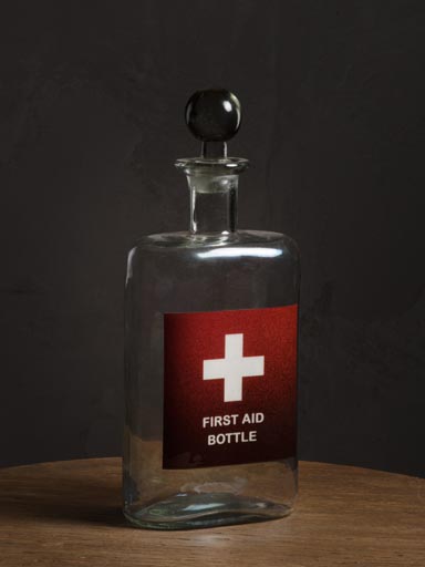 First aid bottle with stopper