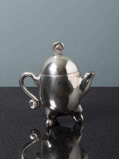 Bougie dans théière