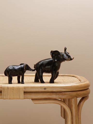 S/2 walking elephants tied by trunk and tail