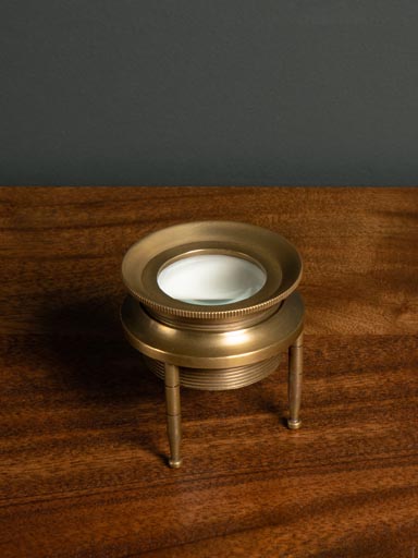 Small brass magnifier on tripod