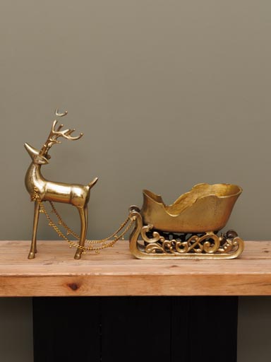 Large reindeer with sledge