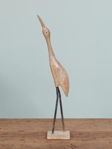 Grand oiseau en bois sur pied