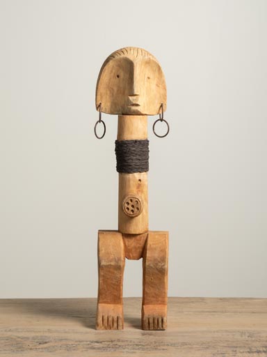 Wooden female figure with earrings