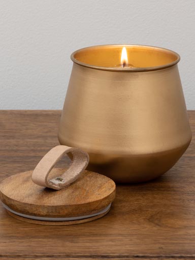 Candle in gold pot with wood and leather lid