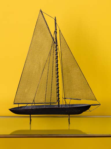 Boat with mesh sails