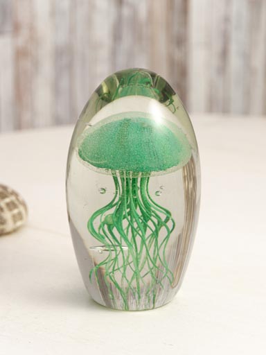 Glass paperweight with light green jellyfish