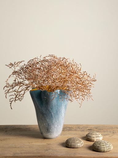 Blue vase with orange inside