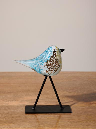 Oiseau bleu et brun en verre sur pied