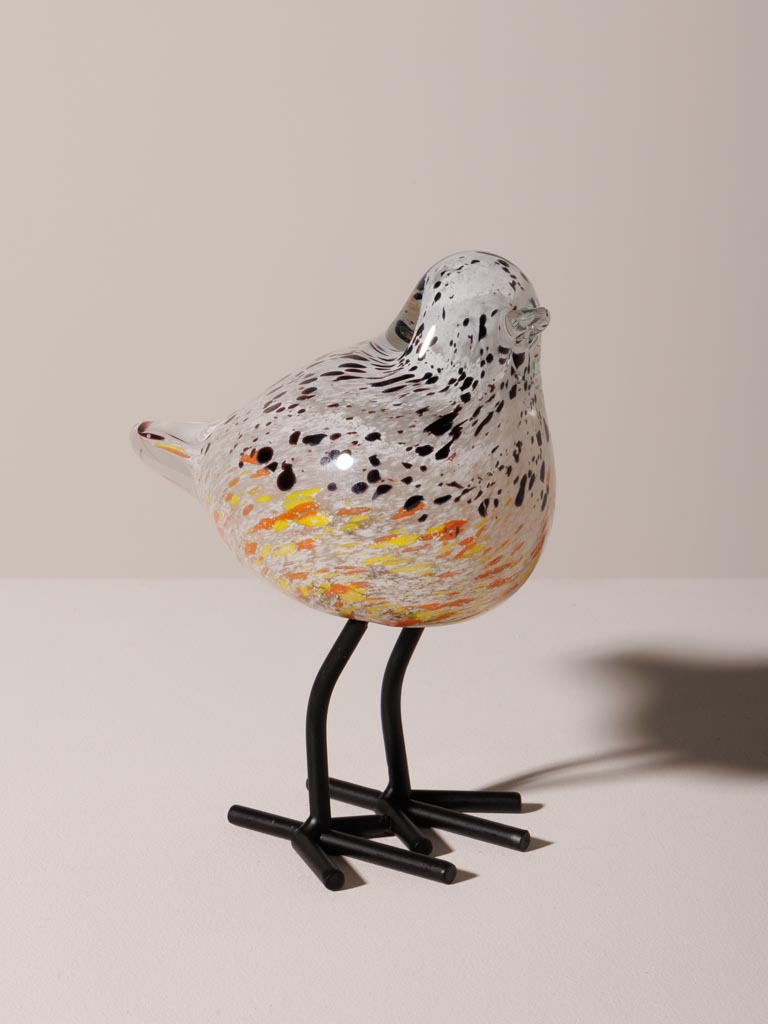 Oiseau moucheté orange sur pied - 1