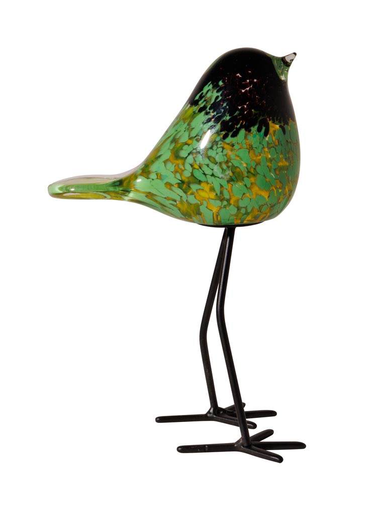 Oiseau vert moucheté noir sur pied - 2
