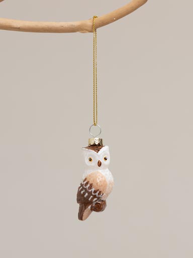 Tiny hanging owl