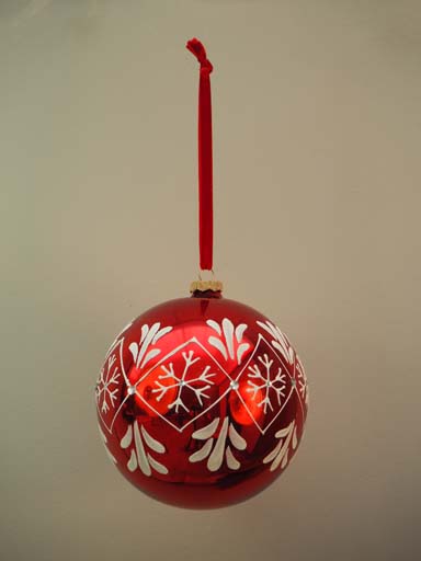 Red Xmas ball with white snowflakes