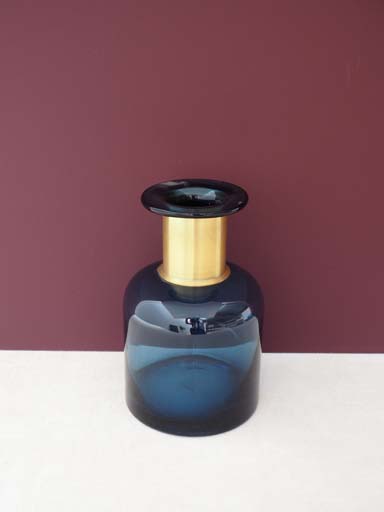 Blue pharmacy bottle with gold detail