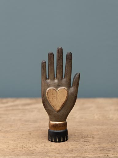 Golden heart on hand wall deco
