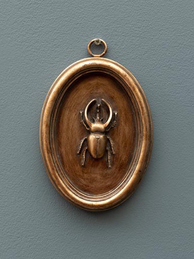 Oval copper frame with beetle A