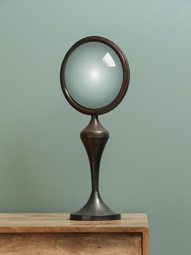 Small convex mirror on iron stand