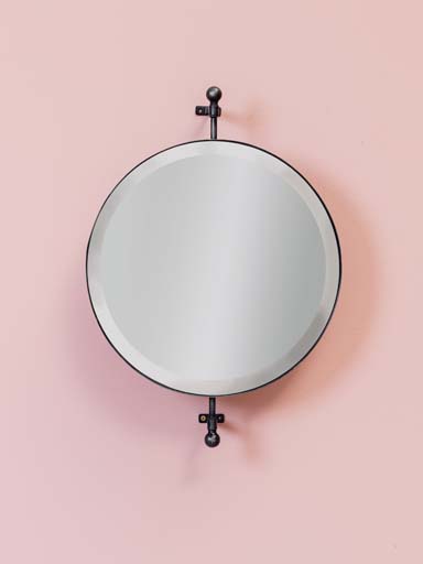Round pivoting mirror