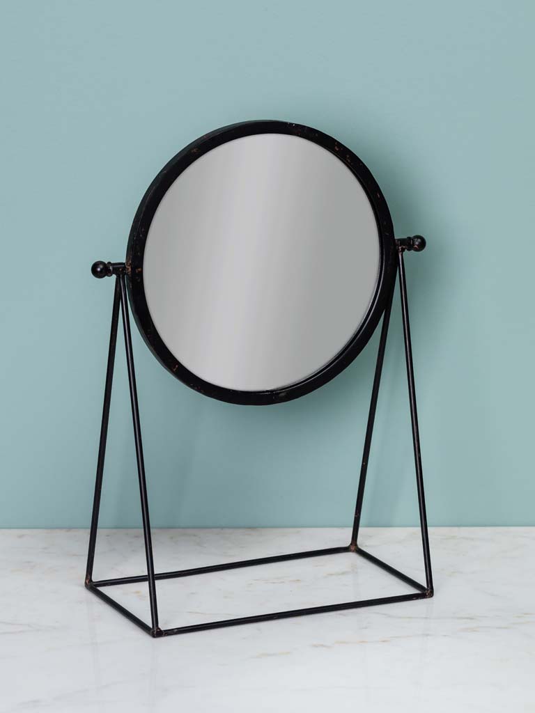 Black round mirror on high stand - 1