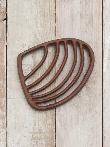 Cast iron rusty trivet shell shaped