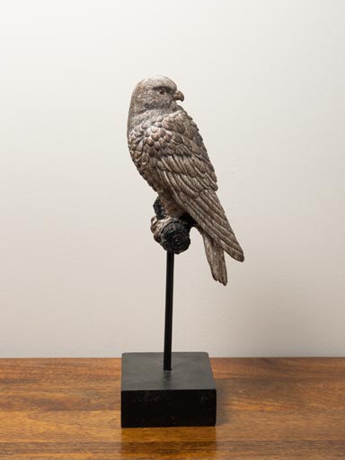 Resin falcon on metal perch