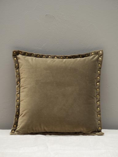 Green cushion with golden studs