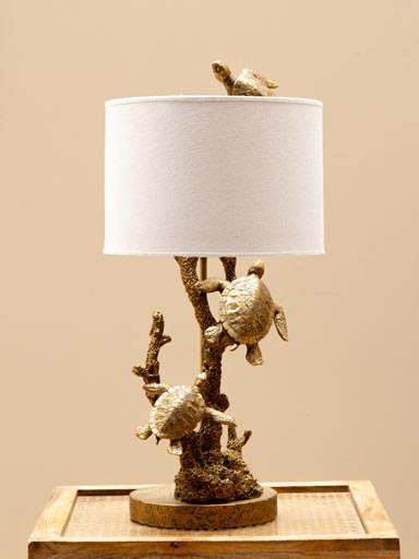 Lamp with swimming golden turtles with white shade