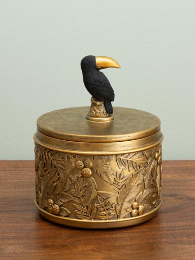Golden box with toucan lid