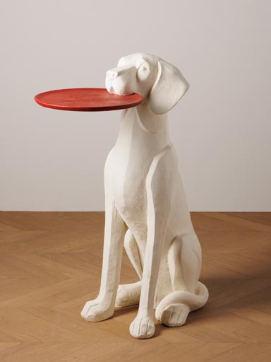 White dog with red tray pedestal