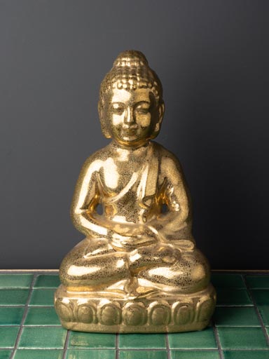 Buddha in golden ceramic