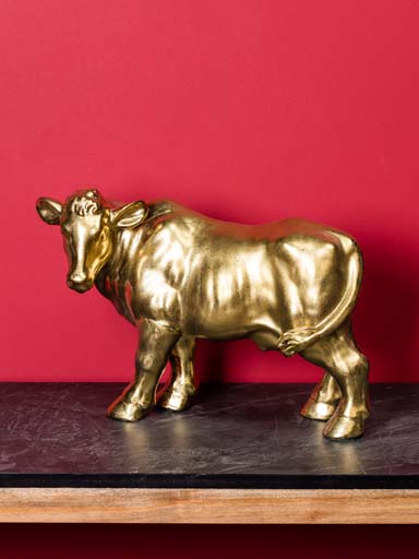 Golden cow in ceramic