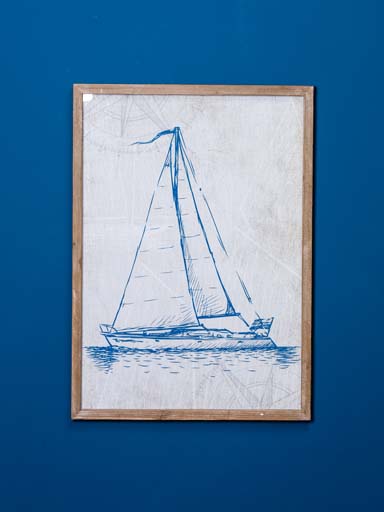 Frame with blue sailing boat
