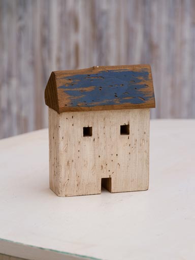 Old decorative beach house with blue roof