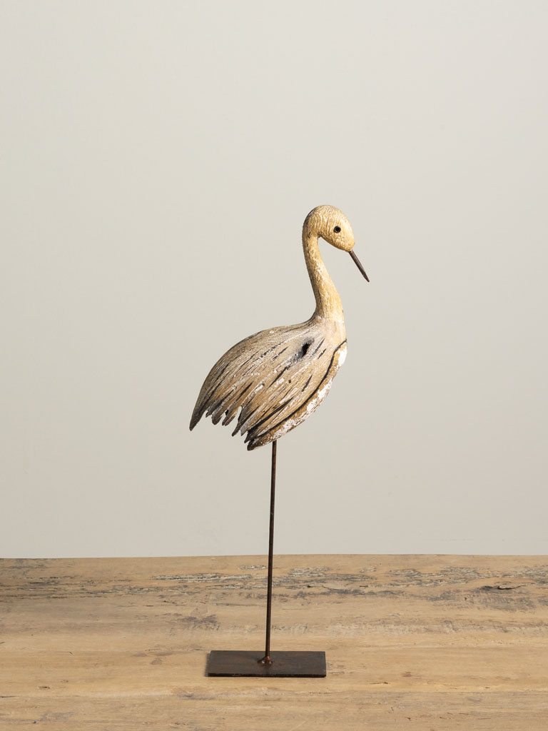 Long beak bird on iron stand - 1