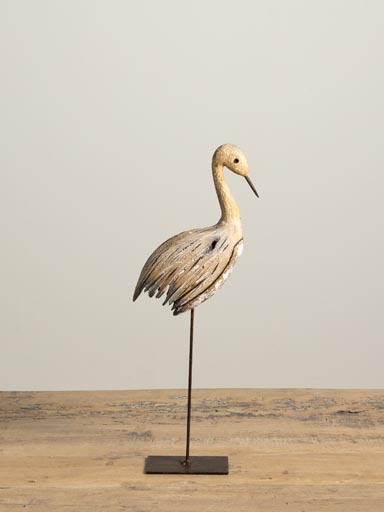 Long beak bird on iron stand