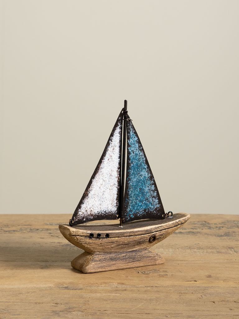 Small boat with blue iron sail - 4