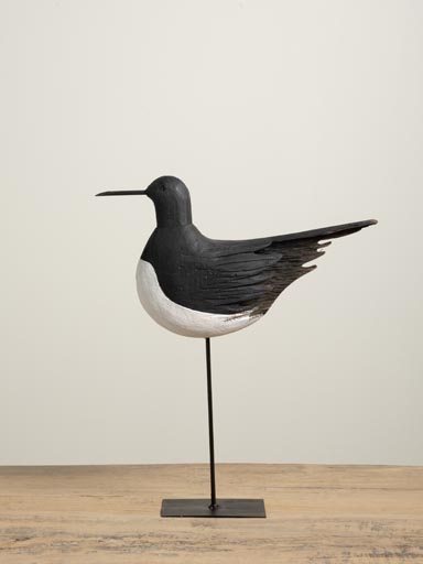 Black bird on iron base