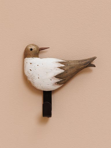 White bird hook in natural wood