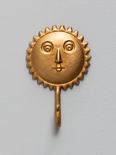 Cast iron hook face of the sun